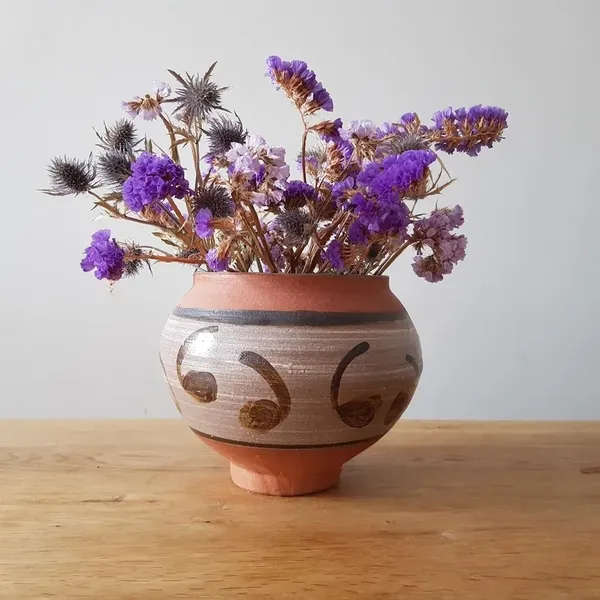 Original photo: dried flowers clay vase
