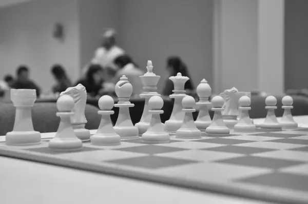 Original photo: white chess pieces tournament